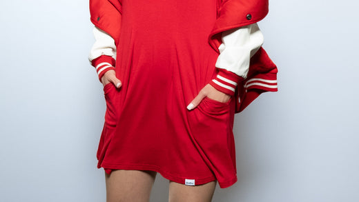 Close up of a woman with her hands in her pockets